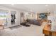 View of finished basement area offering a seating area with a rustic entertainment center at 16135 Rock Crystal Dr, Parker, CO 80134