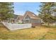 A fenced backyard with a cozy white fence at 2295 S Depew St, Denver, CO 80227