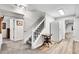 Basement stairs leading to lower level, with a utility closet and access to the kitchen at 2295 S Depew St, Denver, CO 80227
