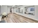 A large home gym showcases wood floors, mirrors, and ample space for fitness activities and exercise equipment at 2295 S Depew St, Denver, CO 80227