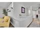 A cozy hallway with views into the living room and bedrooms at 2295 S Depew St, Denver, CO 80227