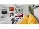 Cozy living room featuring a stone fireplace, and stylish decor at 2295 S Depew St, Denver, CO 80227