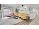 Bright and airy living room with contemporary furnishings, large windows, and modern decor elements at 2295 S Depew St, Denver, CO 80227