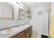 Clean bathroom with double vanity and shower at 3600 S Pierce St # 7-104, Denver, CO 80235