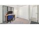 Bright bedroom with desk and ample closet space at 3600 S Pierce St # 7-104, Denver, CO 80235