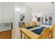 Dining area with kitchen and living room views at 3600 S Pierce St # 7-104, Denver, CO 80235