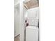 Stackable washer and dryer in laundry closet at 3600 S Pierce St # 7-104, Denver, CO 80235