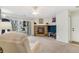 Living room with fireplace, TV, and patio access at 3600 S Pierce St # 7-104, Denver, CO 80235