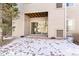 Private patio with snow covered ground at 3600 S Pierce St # 7-104, Denver, CO 80235