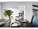 Dining room featuring modern decor and formal place settings at 7307 S Birch St, Centennial, CO 80122