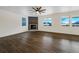 Spacious living room featuring a contemporary fireplace and ample natural light at 339 Rocking Chair Dr, Berthoud, CO 80513