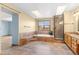 A spacious bathroom with a bathtub and shower at 9983 Cottoncreek Dr, Highlands Ranch, CO 80130