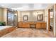 A large bathroom with and sinks and a walk-in shower at 9983 Cottoncreek Dr, Highlands Ranch, CO 80130