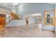 Spacious living room with abundant natural light, light blue walls, and modern flooring at 9983 Cottoncreek Dr, Highlands Ranch, CO 80130
