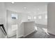 Bright bonus room featuring neutral carpeting, recessed lighting, and multiple windows providing ample natural light at 250 Lark Sparrow Way, Bennett, CO 80102