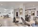 Large, well-lit basement with exercise equipment, ping pong table, and multiple workout spaces at 4158 Wild Flower Ct, Evergreen, CO 80439