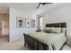 This bedroom features a comfortable bed, carpeted floors, and decor art at 12301 Festival Ln, Thornton, CO 80241