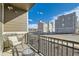 Comfortable patio with outdoor seating and views of the street at 12301 Festival Ln, Thornton, CO 80241