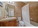 This bathroom has a shower-tub combo and a classic vanity with ample counter space at 15789 W 95Th Pl, Arvada, CO 80007