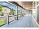 This is an image of the deck featuring railing and views of the neighborhood at 9607 Williamsburg St, Littleton, CO 80125