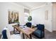 Cozy home office with a wooden desk, comfortable chairs, and stylish decor at 9607 Williamsburg St, Littleton, CO 80125