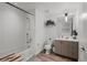 Bright bathroom featuring a shower-tub combo, modern vanity, and sleek fixtures at 1750 Wewatta St # 605, Denver, CO 80202