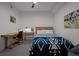 A modern bedroom with a cozy bed, stylish furnishings, and a serene atmosphere at 1750 Wewatta St # 605, Denver, CO 80202