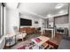 Spacious open-concept living room with modern furniture and wood floors at 1750 Wewatta St # 605, Denver, CO 80202