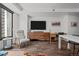 Comfortable living room with city views, hardwood floors, and a relaxed seating area at 1750 Wewatta St # 605, Denver, CO 80202
