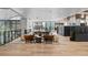Modern lobby area with a fireplace, comfortable seating, and a view of the city at 1750 Wewatta St # 605, Denver, CO 80202