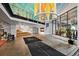 Expansive lobby featuring modern art, a staircase, and floor-to-ceiling windows at 1750 Wewatta St # 605, Denver, CO 80202
