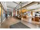 Stylish lobby with coffee shop, seating, and ample space to meet and greet at 1750 Wewatta St # 605, Denver, CO 80202
