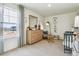 Modern Bedroom with a large window, a small grey crib, and stuffed animal décor at 27756 E Byers Pl, Aurora, CO 80018