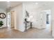 Bright hallway with modern decor, neutral paint, and carpet flooring at 27756 E Byers Pl, Aurora, CO 80018