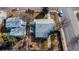 Overhead view of the home showcasing a backyard with a fire pit and play area, plus a detached garage at 705 Kenton St, Aurora, CO 80010