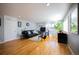 Spacious living room featuring hardwood floors and natural light at 705 Kenton St, Aurora, CO 80010