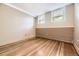Bedroom space features two bright windows and hardwood floors at 108 W Byers Pl # G1, Denver, CO 80223