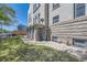 Charming back entrance to this updated apartment building, surrounded by green space at 108 W Byers Pl # G1, Denver, CO 80223