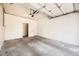 Empty garage space with concrete flooring at 108 W Byers Pl # G1, Denver, CO 80223