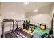 Workout area features exercise equipment and colorful gym flooring at 108 W Byers Pl # G1, Denver, CO 80223