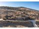 Aerial view of home on hill surrounded by scenic landscape at 11683 Pointe View Dr, Longmont, CO 80503