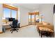 Bright room with office and chair and view to the outside at 11683 Pointe View Dr, Longmont, CO 80503