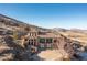 Spectacular view of the exterior elevation of the home with mountain in background at 11683 Pointe View Dr, Longmont, CO 80503