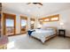 Bright bedroom with natural light and access to a private deck with views at 11683 Pointe View Dr, Longmont, CO 80503