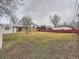 Expansive backyard featuring partial fence and shed at 2893 S Joslin Ct, Denver, CO 80227