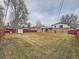 Spacious backyard with shed and partial fence at 2893 S Joslin Ct, Denver, CO 80227