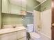 Functional bathroom with a tub/shower combination and a white vanity with a mirror at 2893 S Joslin Ct, Denver, CO 80227