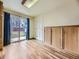 Cozy dining area with wood floors and sliding glass doors that open to the backyard at 2893 S Joslin Ct, Denver, CO 80227