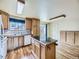 Functional kitchen features a central island, ample counter space, and modern appliances at 2893 S Joslin Ct, Denver, CO 80227