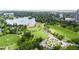 Panoramic view of a park with lake, trees, and pathways, surrounded by urban development at 1519 E 29Th Ave, Denver, CO 80205